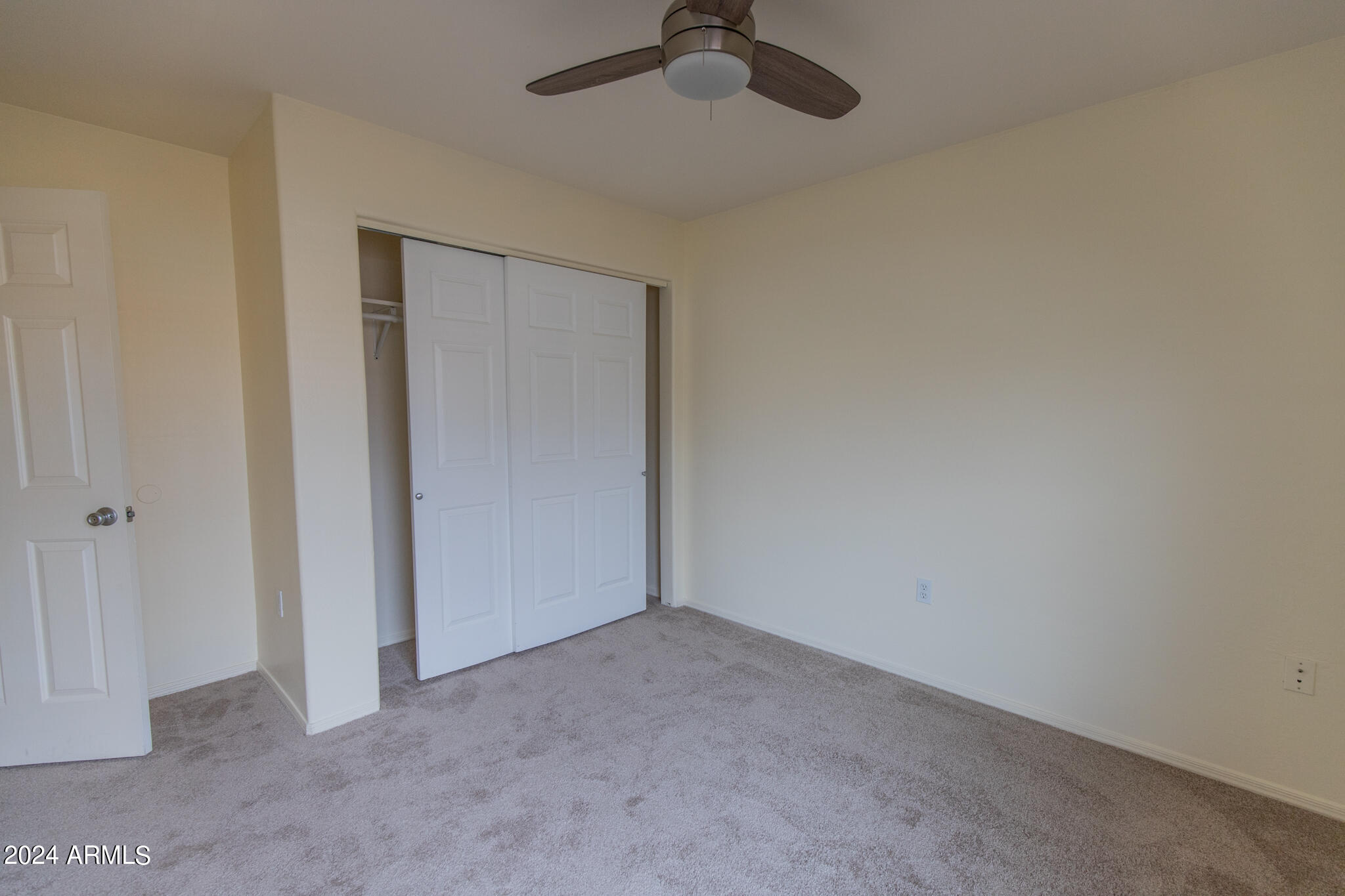 9013 North 14th Street Phoenix, AZ 85020 - Photo 19 of 24 a view of an empty room and chandelier fan
