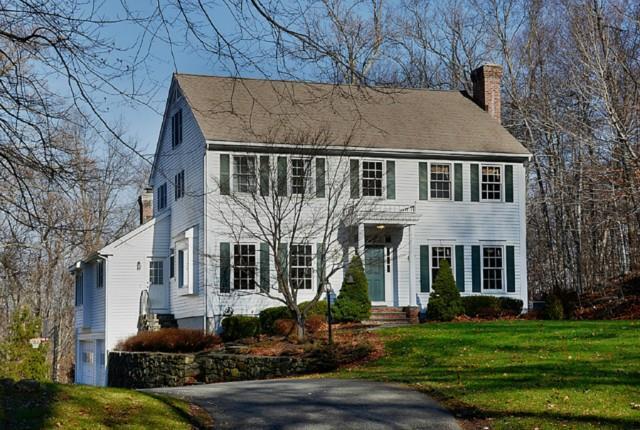 11 Lost Mine Place Ridgefield, CT 06877 - Photo 1 of 1 a front view of a house with a yard