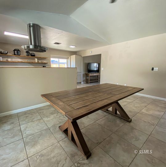 205 Kimberly Lane Ridgecrest, CA 93555 - Photo 12 of 39 a kitchen with stainless steel appliances a sink and a stove