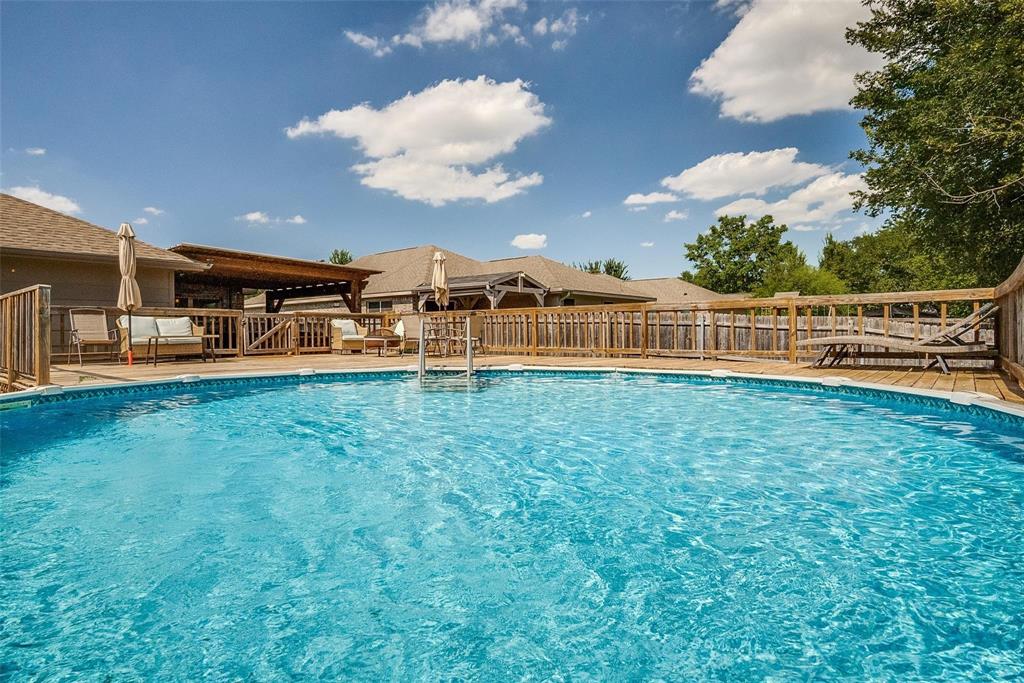 227 Walnut Bend Road Springtown, TX 76082 - Photo 27 of 31 a view of a house with a big yard