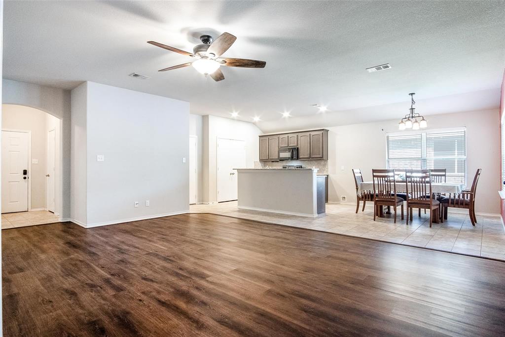 227 Walnut Bend Road Springtown, TX 76082 - Photo 6 of 31 a view of dining room with furniture and wooden floor