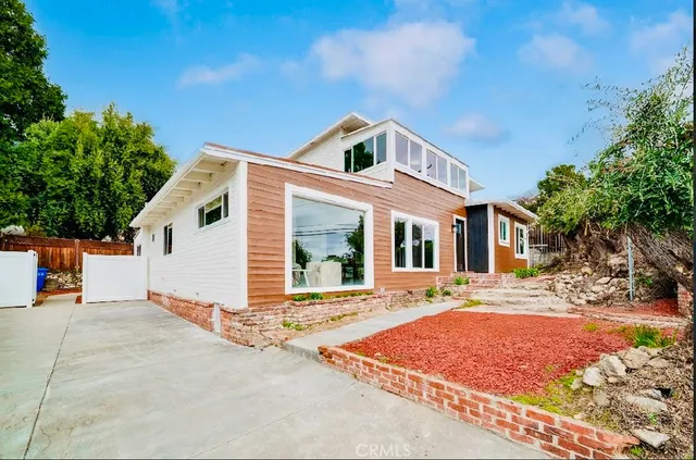 a front view of a house with a patio