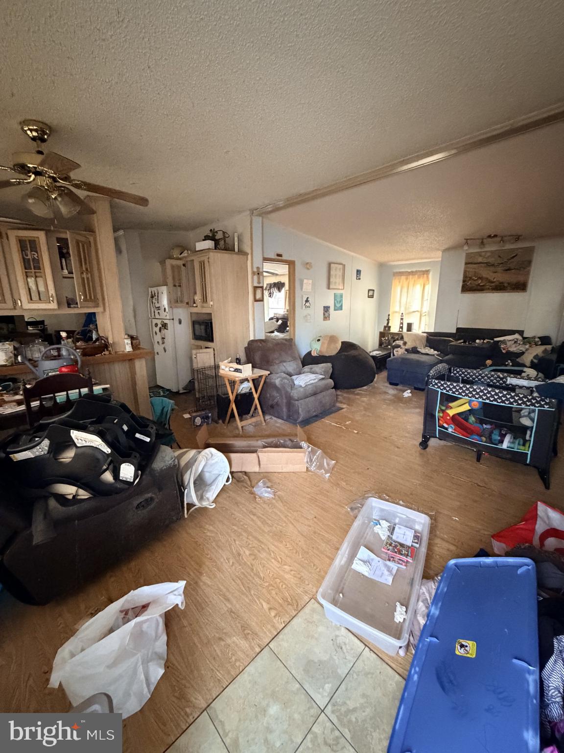 1109 Eastham Road Bumpass, VA 23024 - Photo 7 of 9 a living room with furniture a flat screen tv and a couch
