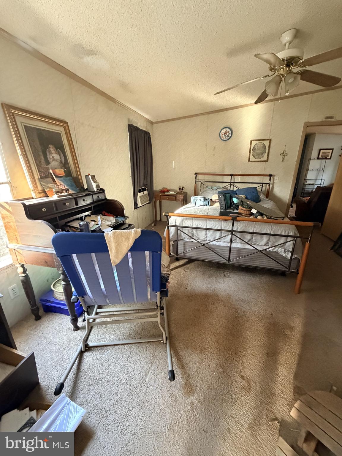 1109 Eastham Road Bumpass, VA 23024 - Photo 8 of 9 a living room with furniture gym equipment and a flat screen tv