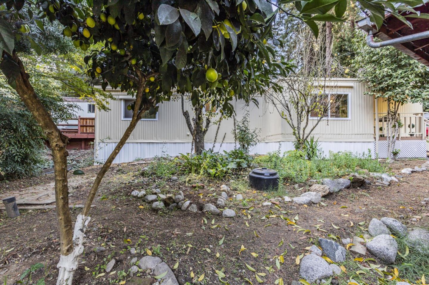 265 Brown Gables Road, Unit 34 Ben Lomond, CA 95005 - Photo 26 of 33 a front view of a house with garden
