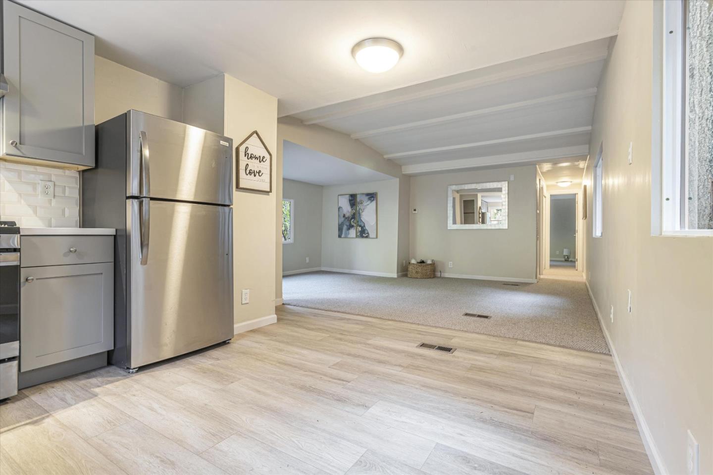 265 Brown Gables Road, Unit 34 Ben Lomond, CA 95005 - Photo 4 of 33 a view of a kitchen with a refrigerator cabinets and a wooden floor