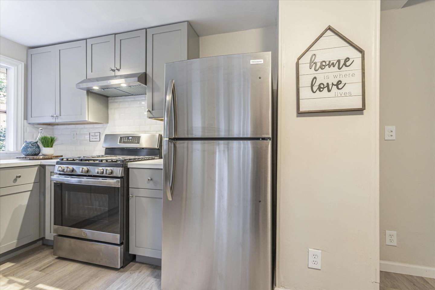 265 Brown Gables Road, Unit 34 Ben Lomond, CA 95005 - Photo 6 of 33 a white refrigerator freezer sitting inside of a kitchen