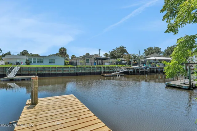 a view of a lake with houses