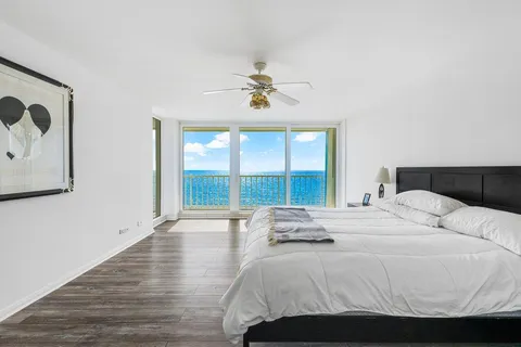 a bathroom with a granite countertop sink mirror and vanity