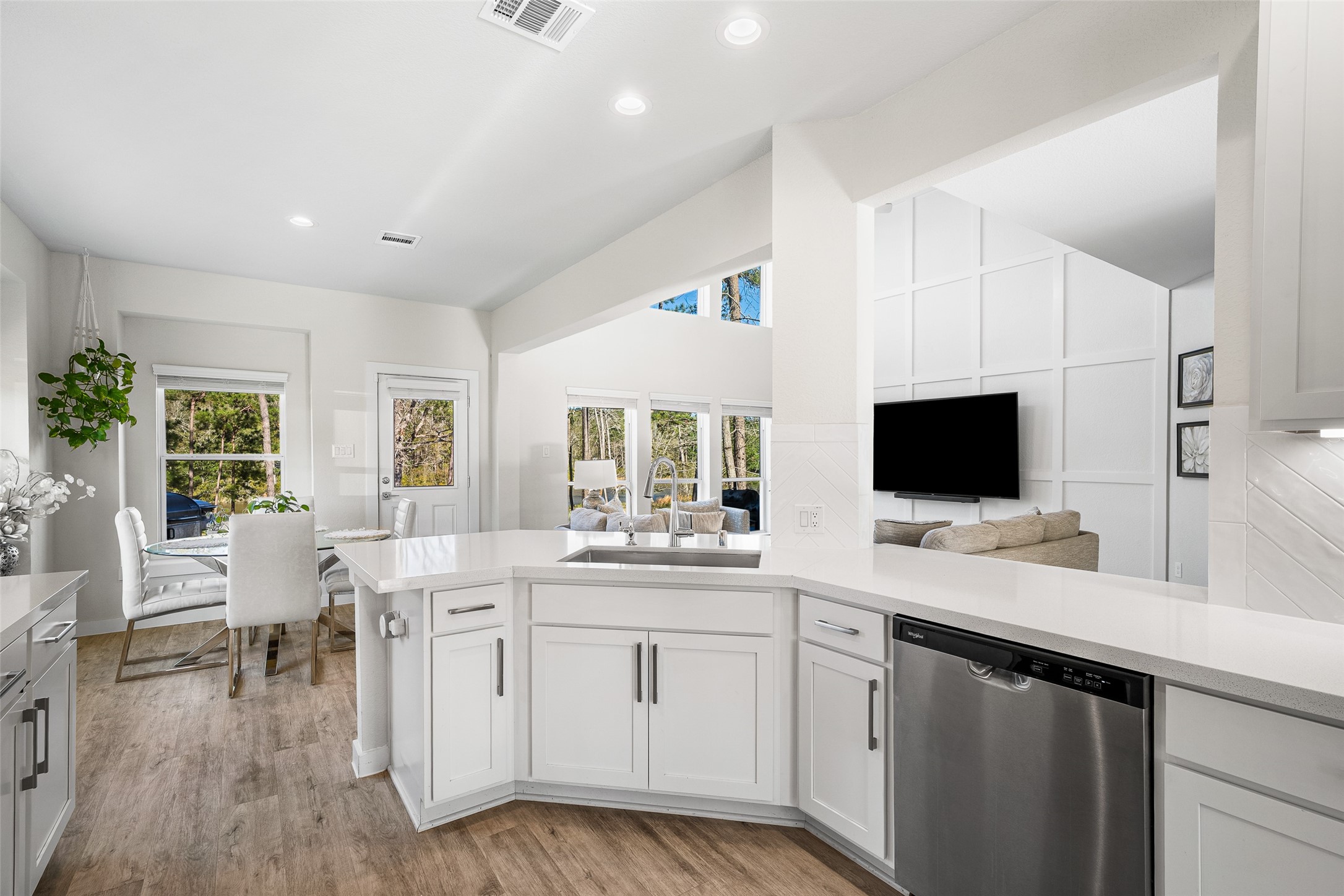 11731 Oakwood Rnch Drive Willis, TX 77378 - Photo 12 of 43 a kitchen with a sink and wooden floor