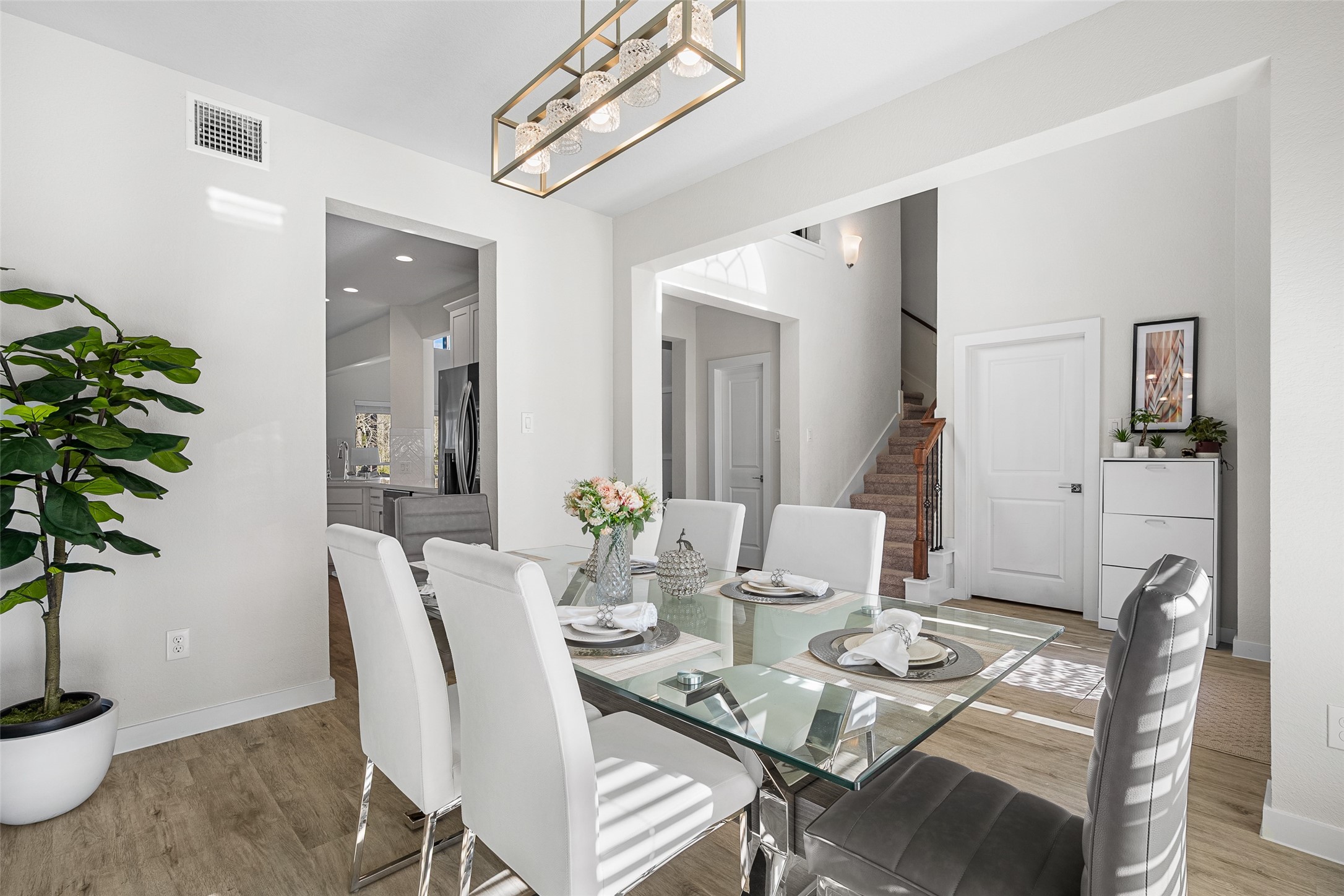 11731 Oakwood Rnch Drive Willis, TX 77378 - Photo 19 of 43 a view of a dining room with furniture window and flowerpot