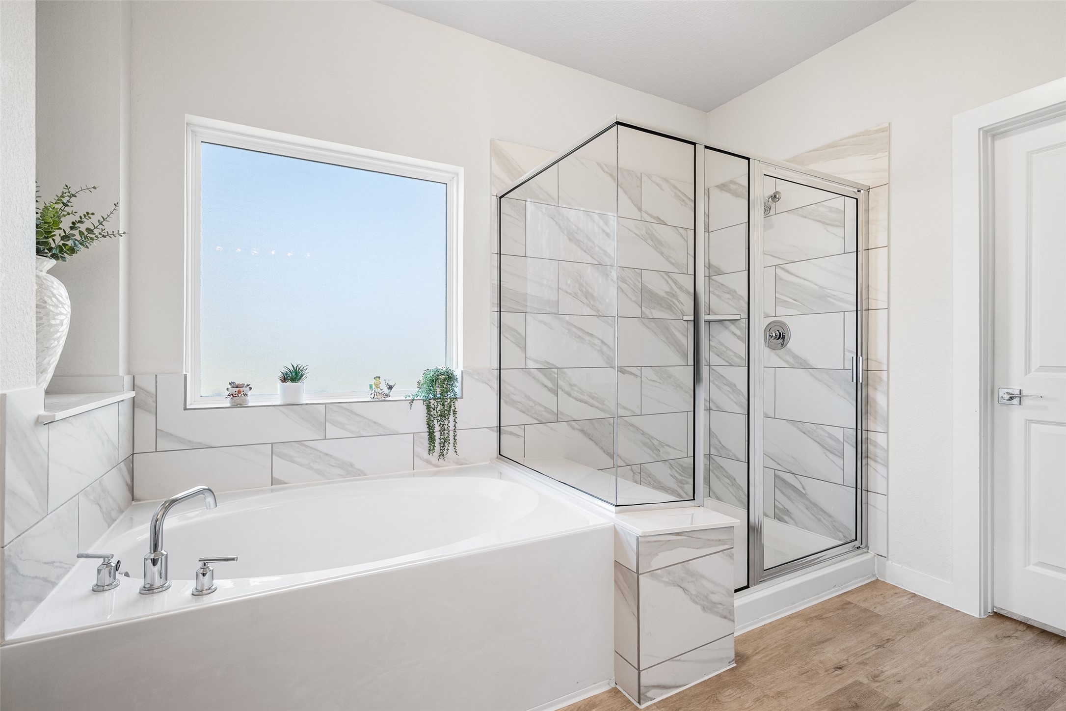 11731 Oakwood Rnch Drive Willis, TX 77378 - Photo 23 of 43 a bathroom with a bathtub and a sink