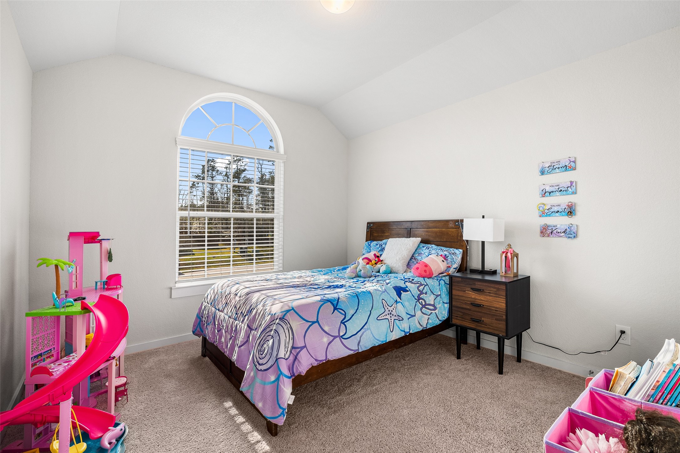 11731 Oakwood Rnch Drive Willis, TX 77378 - Photo 29 of 43 a bedroom with a bed and a window