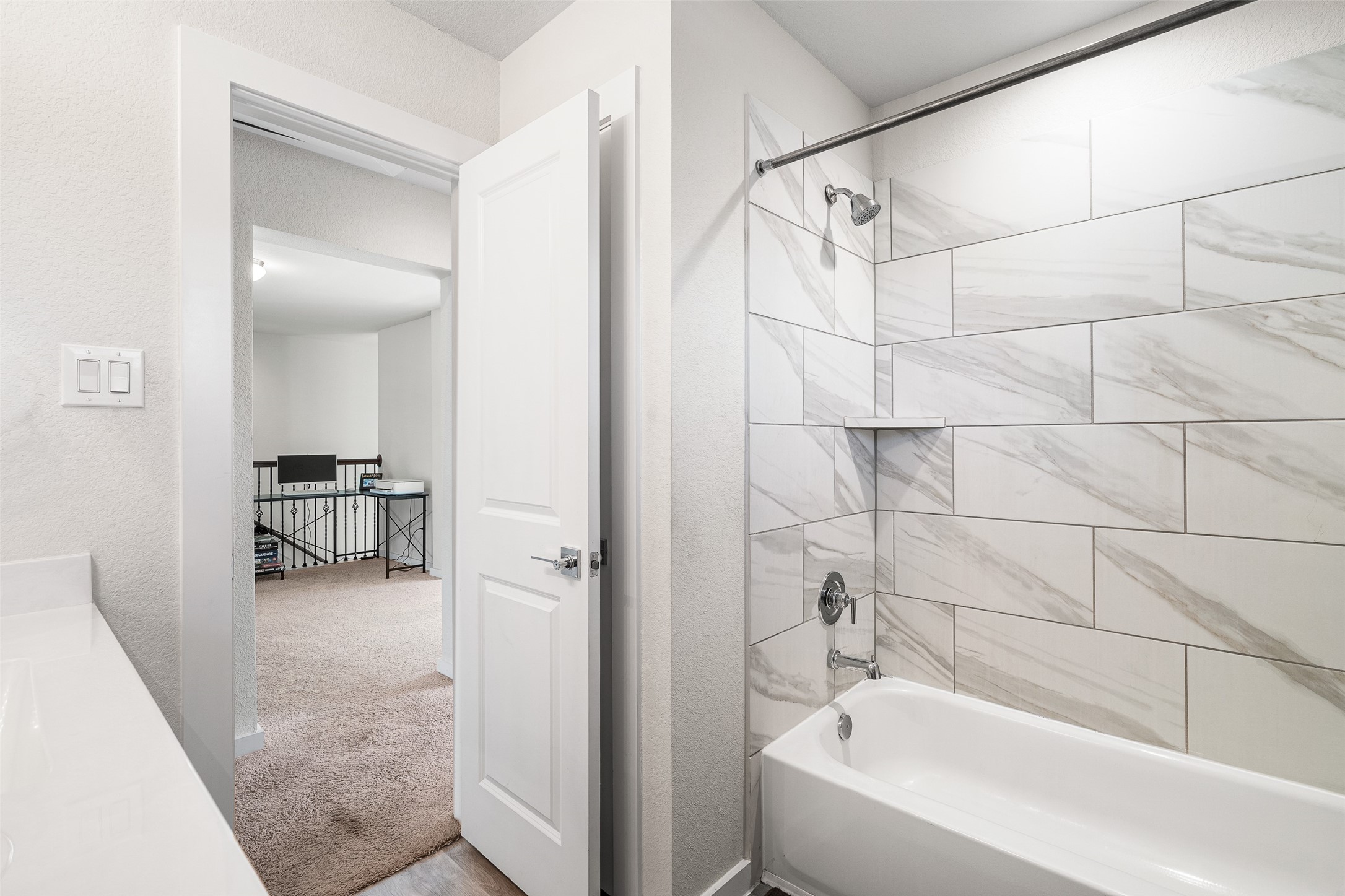 11731 Oakwood Rnch Drive Willis, TX 77378 - Photo 31 of 43 a bathroom with a tub and a shower