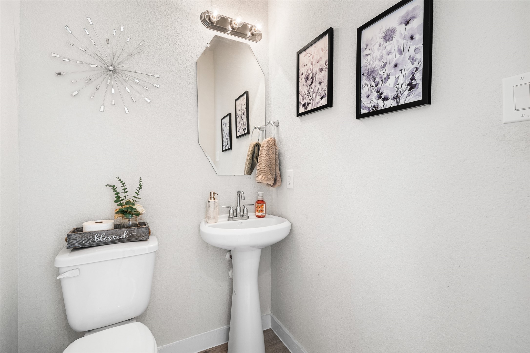 11731 Oakwood Rnch Drive Willis, TX 77378 - Photo 33 of 43 a bathroom with a toilet sink and mirror