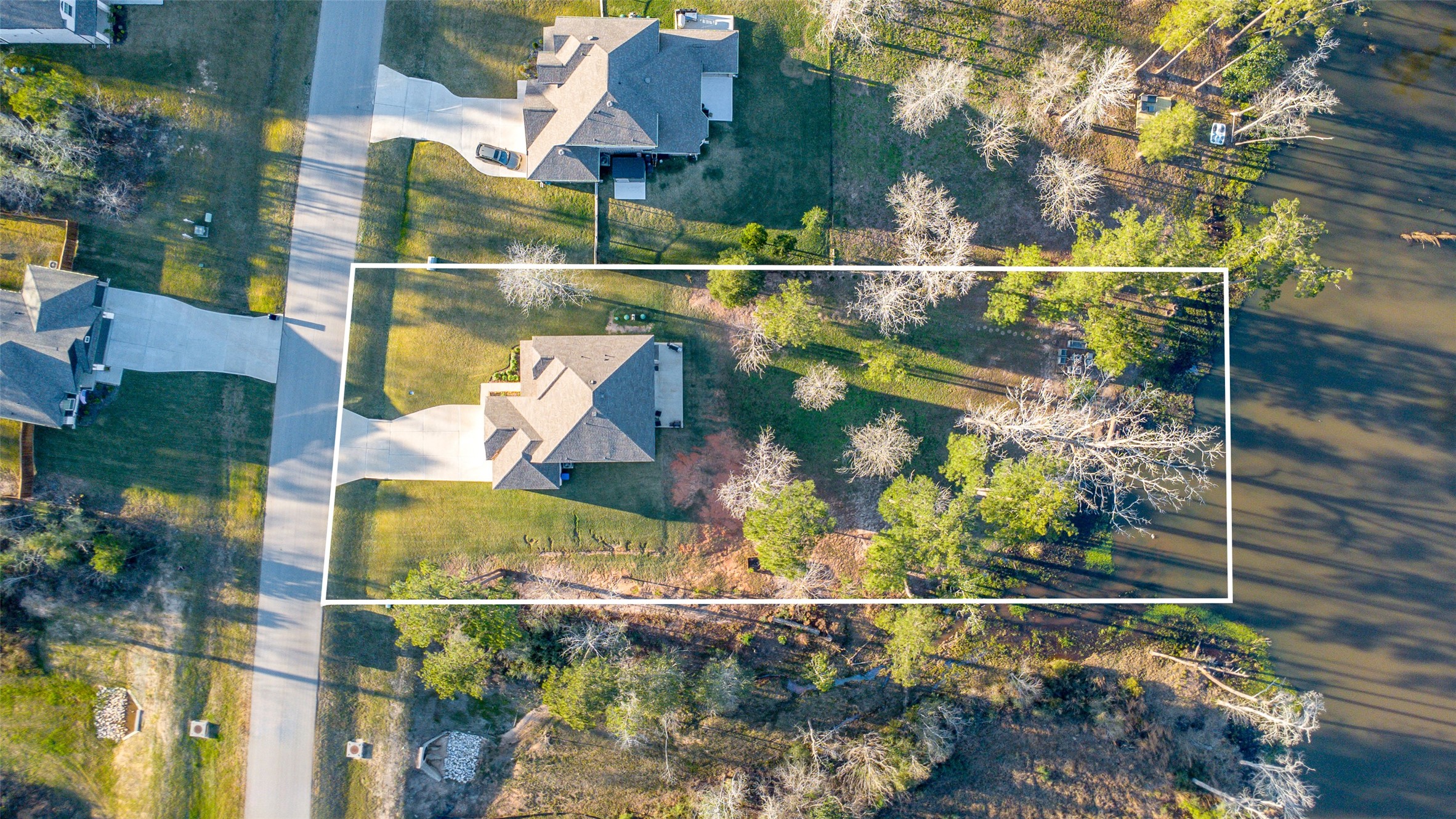 11731 Oakwood Rnch Drive Willis, TX 77378 - Photo 40 of 43 an aerial view of houses with a street