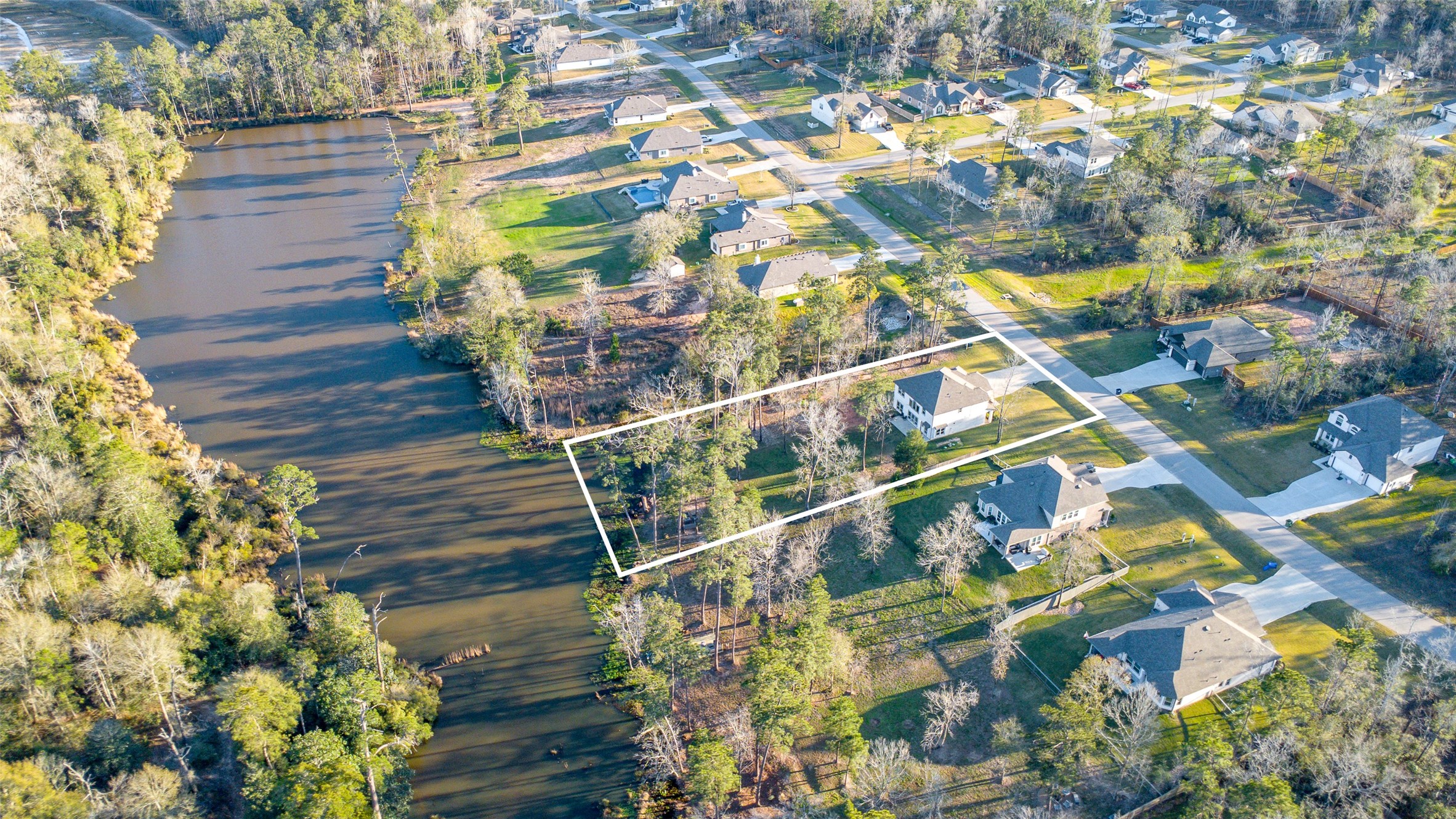 11731 Oakwood Rnch Drive Willis, TX 77378 - Photo 41 of 43 a view of building with wooden floor