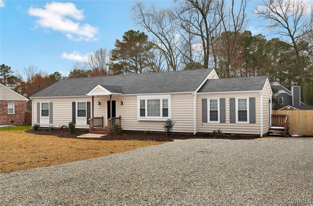 3124 Brookforest Road Midlothian, VA 23112 - Photo 2 of 24 a front view of a house with a yard