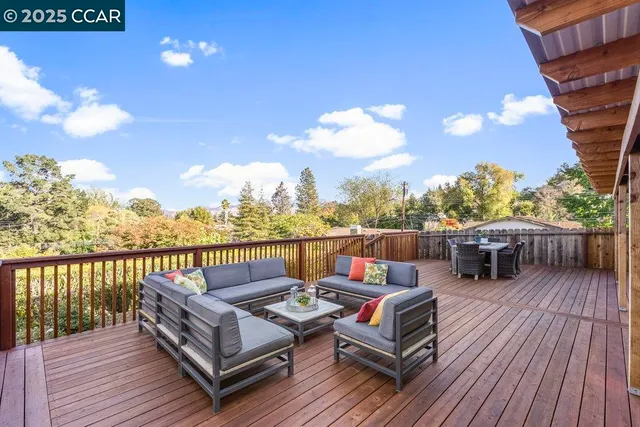 a view of a roof deck with couches