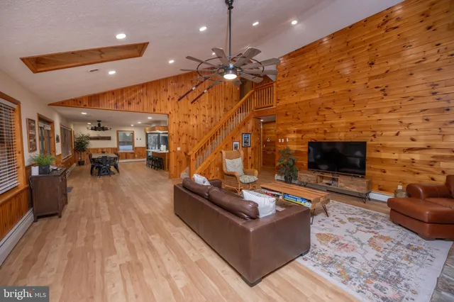 a bathroom with a tub sink and shower