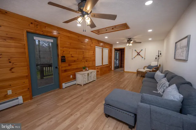 a living room with furniture and a rug