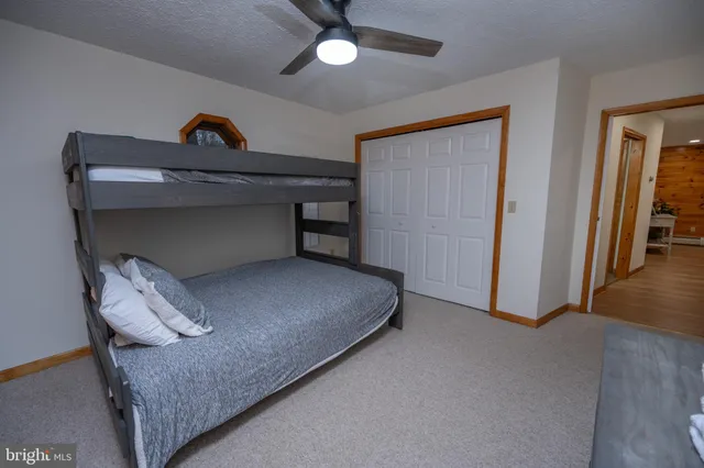 a backyard of a house with yard and outdoor seating