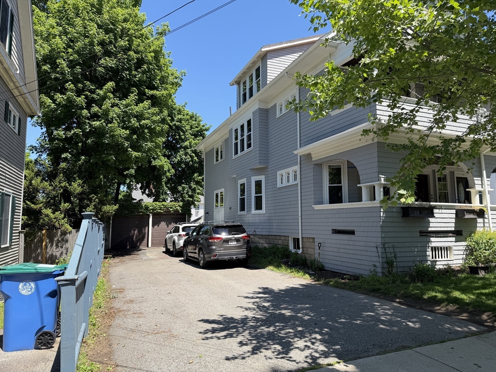12-14 Warwick Road, Unit 12 Belmont, MA 02478 - Photo 15 of 15 a view of a house with a yard