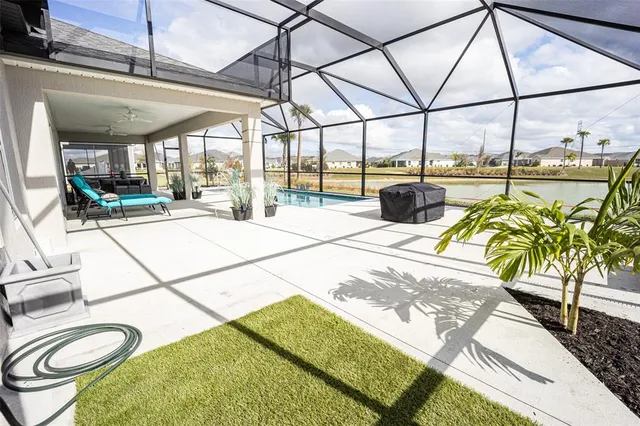 a view of a lake with a big yard