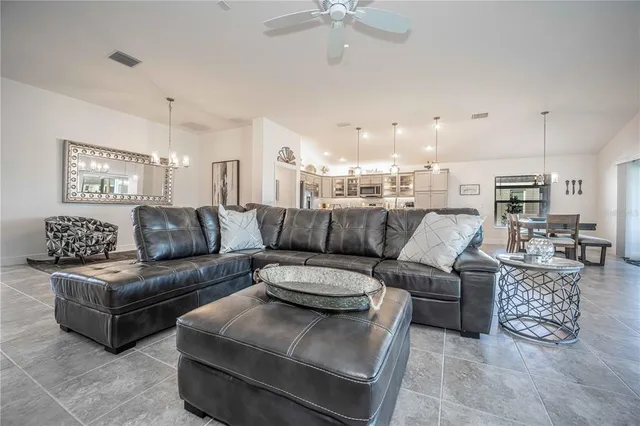 a spacious bedroom with a bed and cabinets