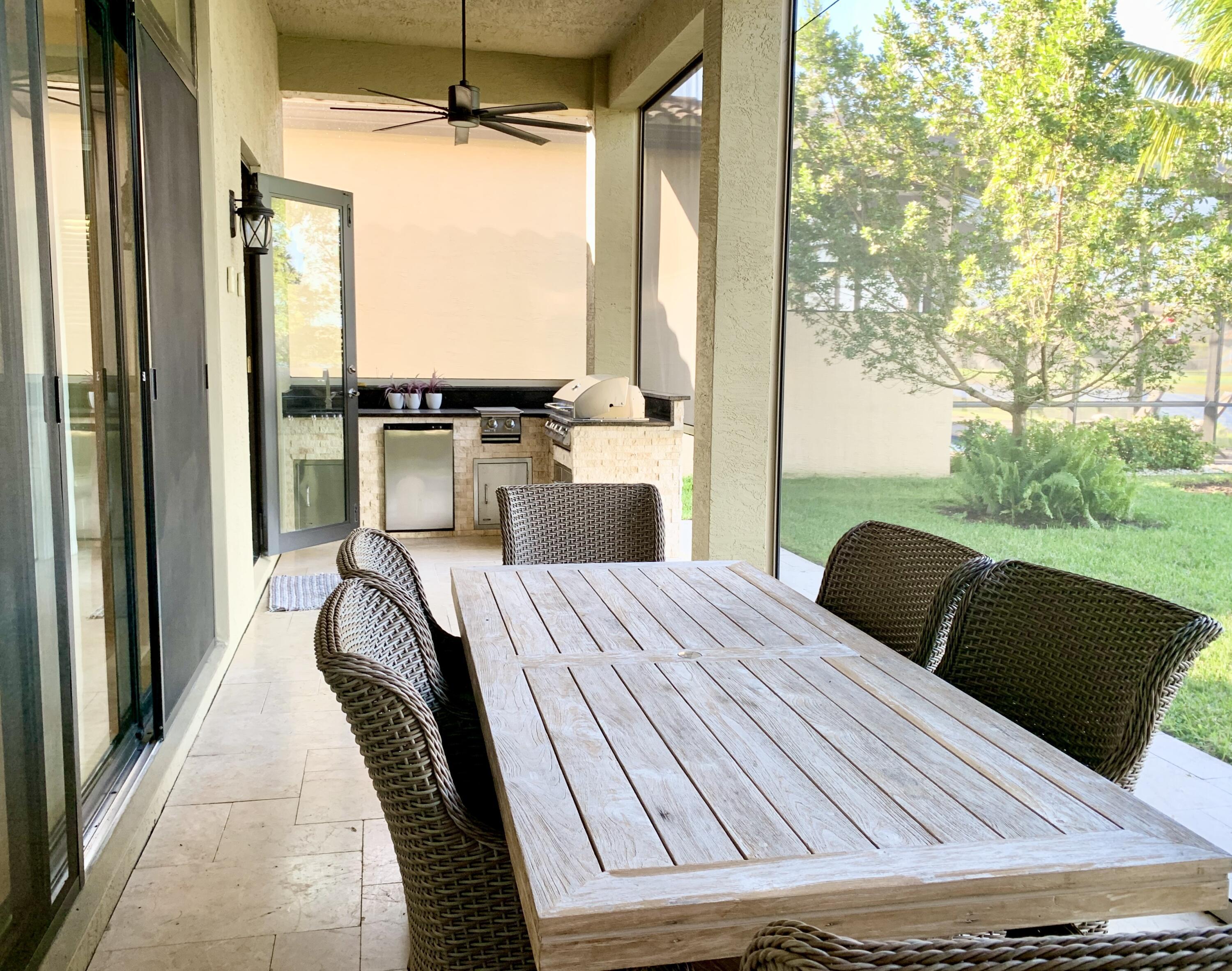 16831 Pavilion Way Delray Beach, FL 33446 - Photo 20 of 26 a bedroom with a bed and a window