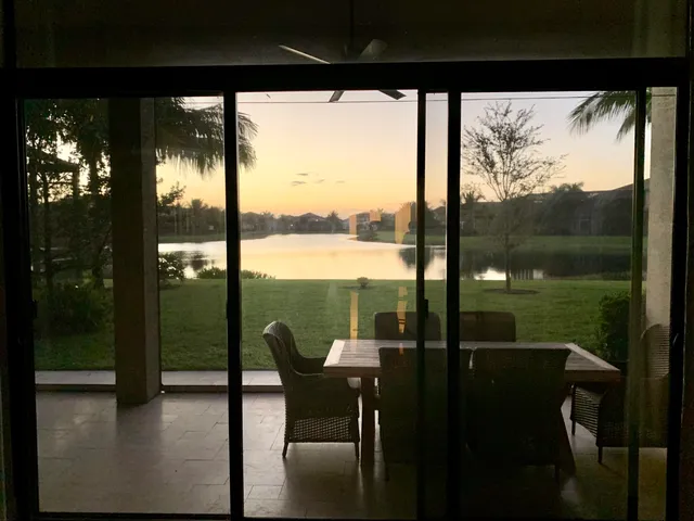 a view of a lake from a porch