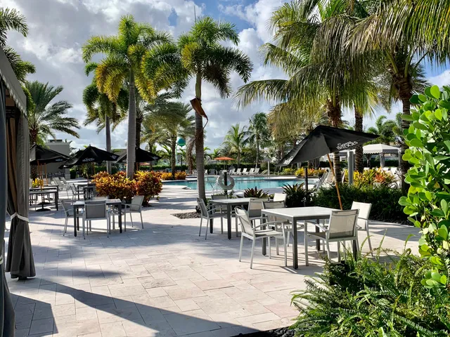 a view of a chairs and tables in patio