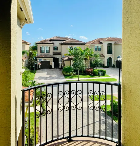 a balcony view with a garden space