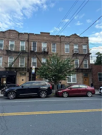 a cars parked in front of a buildings