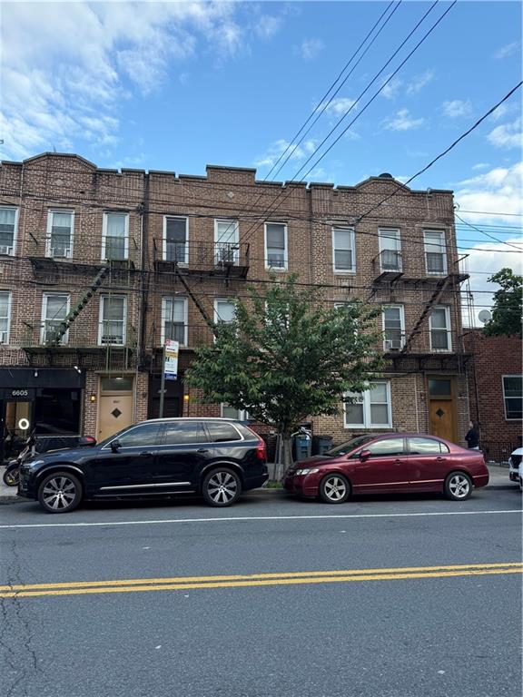 a cars parked in front of a buildings