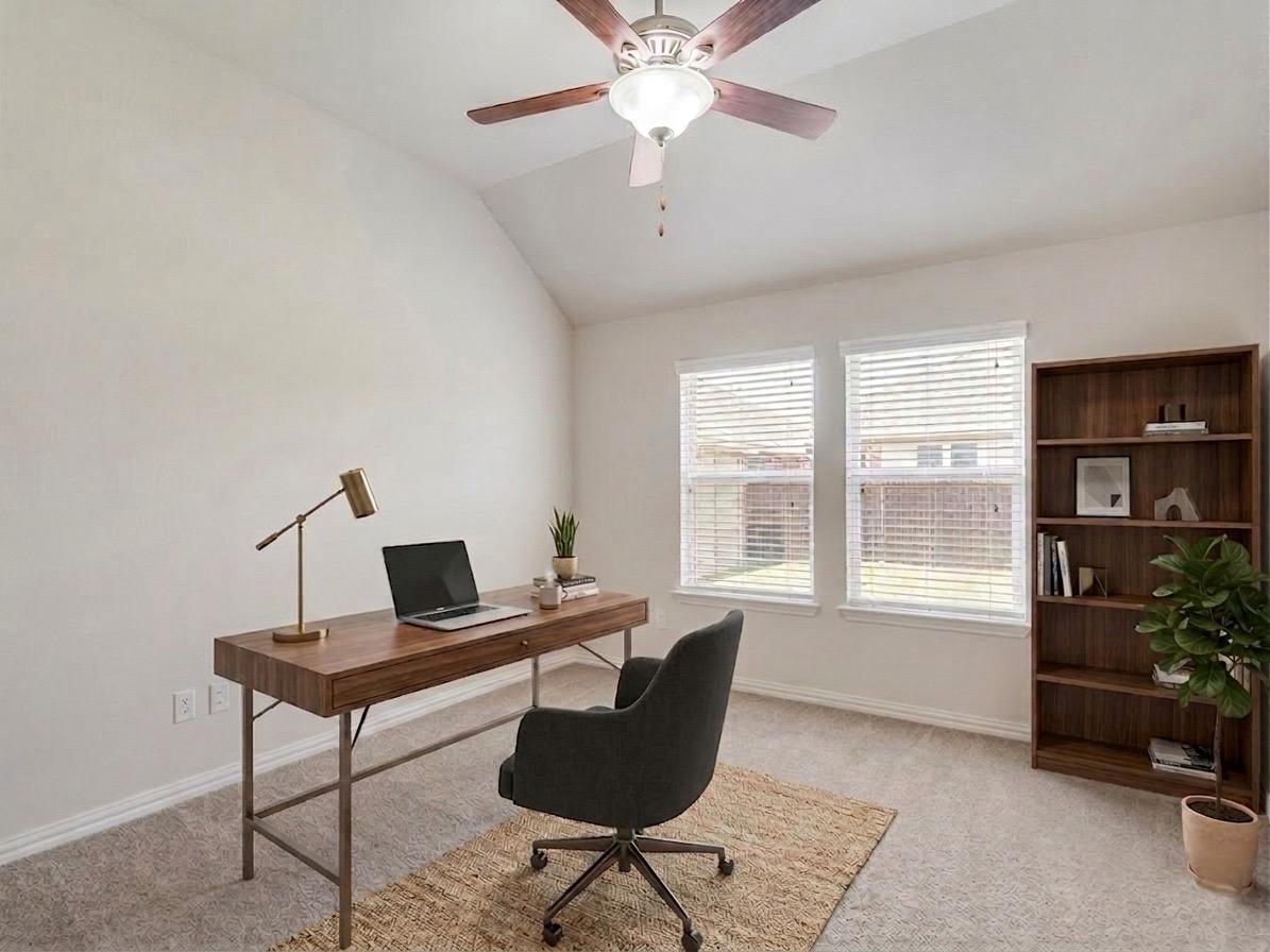 22005 Rhiannon Lane Pflugerville, TX 78660 - Photo 6 of 21 a workspace with furniture and window