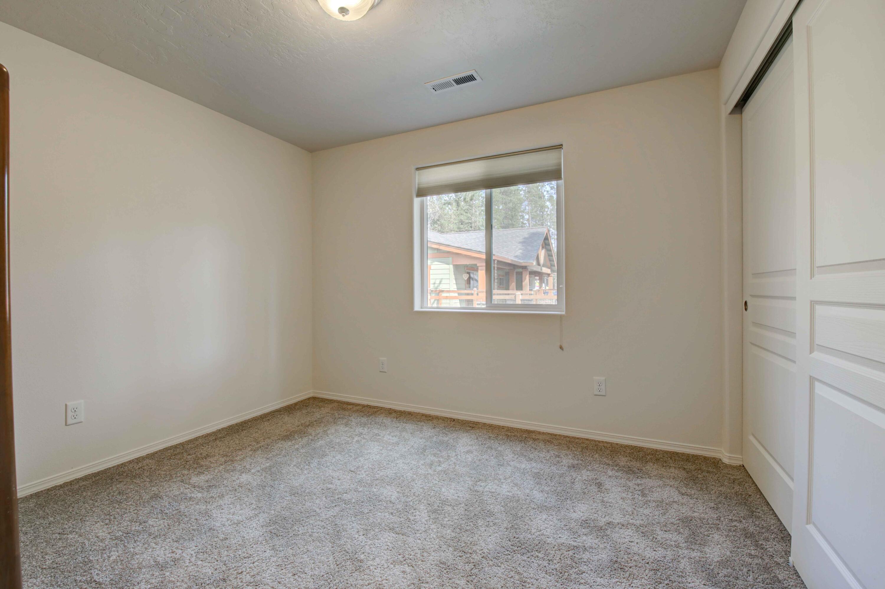 17160 Elsinore Road Bend, OR 97707 - Photo 26 of 47 an empty room with a window