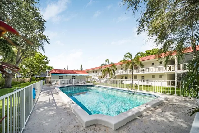 a view of swimming pool from a balcony