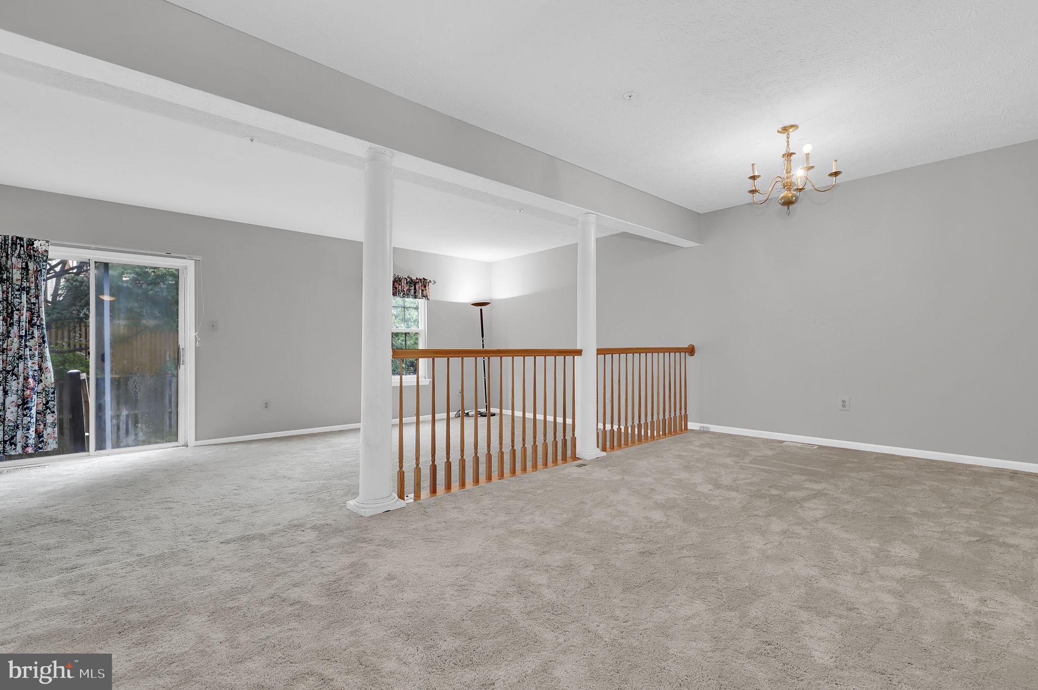 9216 Howland Road Laurel, MD 20723 - Photo 7 of 28 a view of a livingroom with stairs