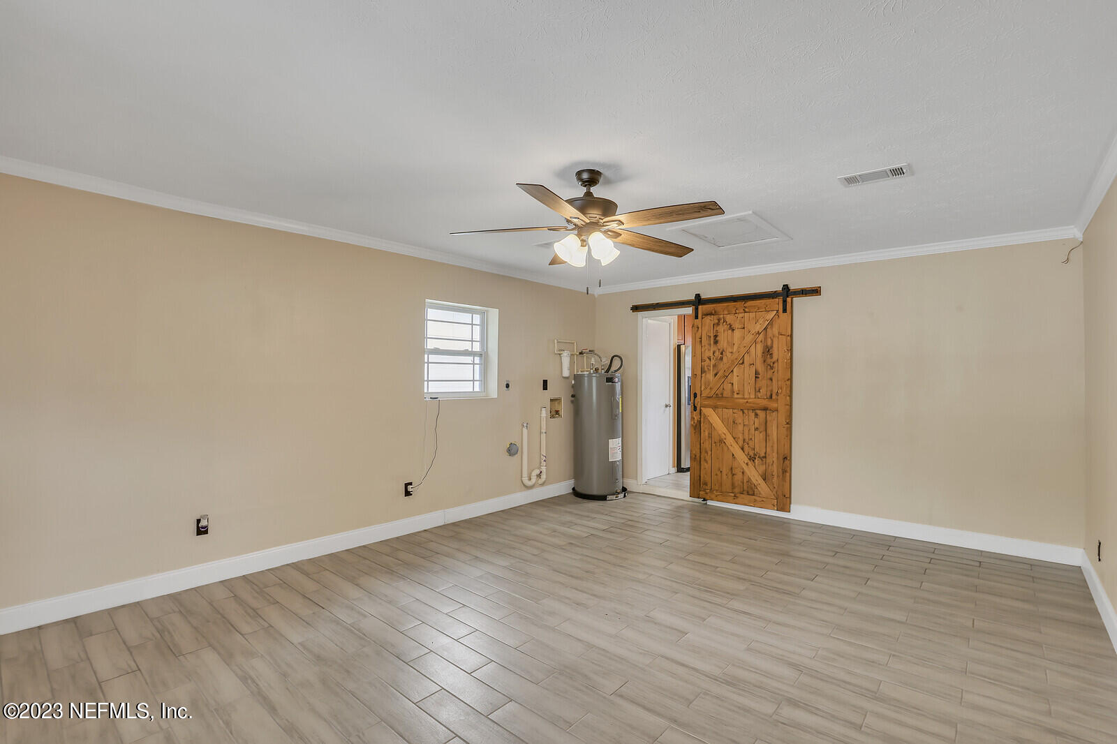 5814 Rover Drive Jacksonville, FL 32244 - Photo 23 of 30 a view of an empty room with a window