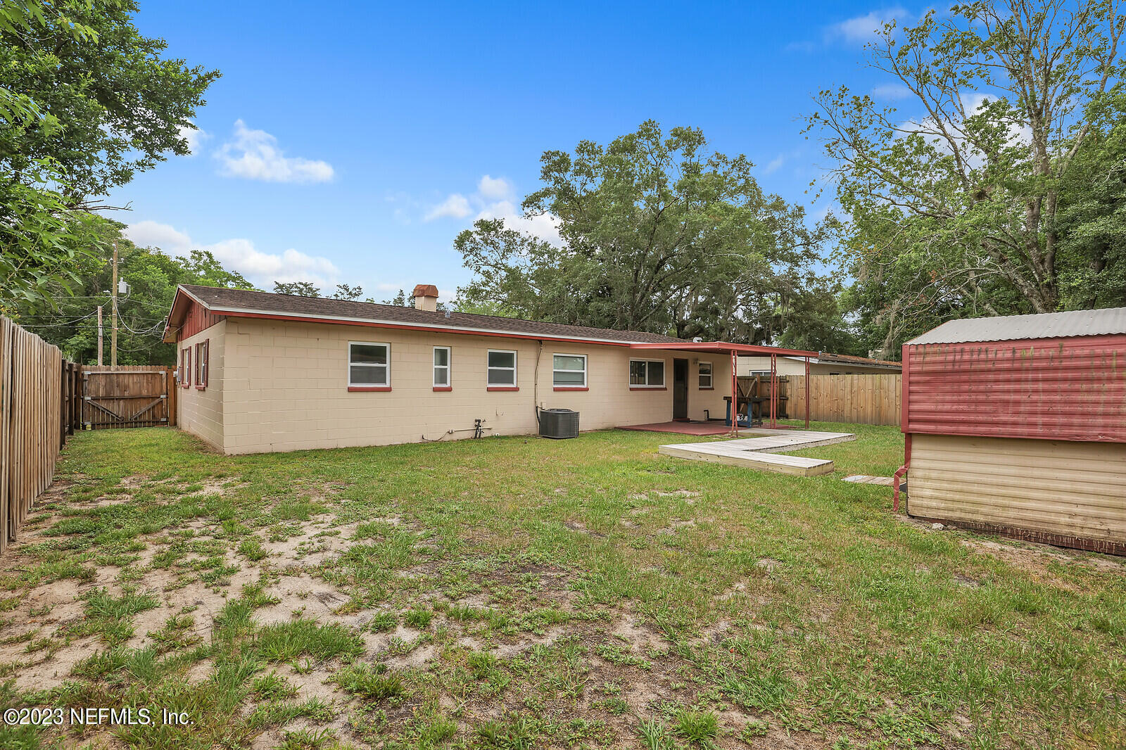 5814 Rover Drive Jacksonville, FL 32244 - Photo 26 of 30 a view of a house with a yard