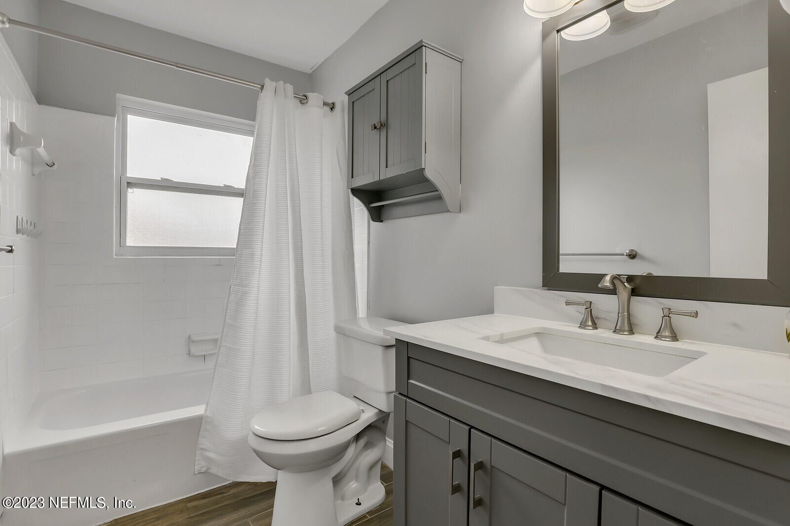 5814 Rover Drive Jacksonville, FL 32244 - Photo 8 of 30 a bathroom with a sink a toilet and a bathtub
