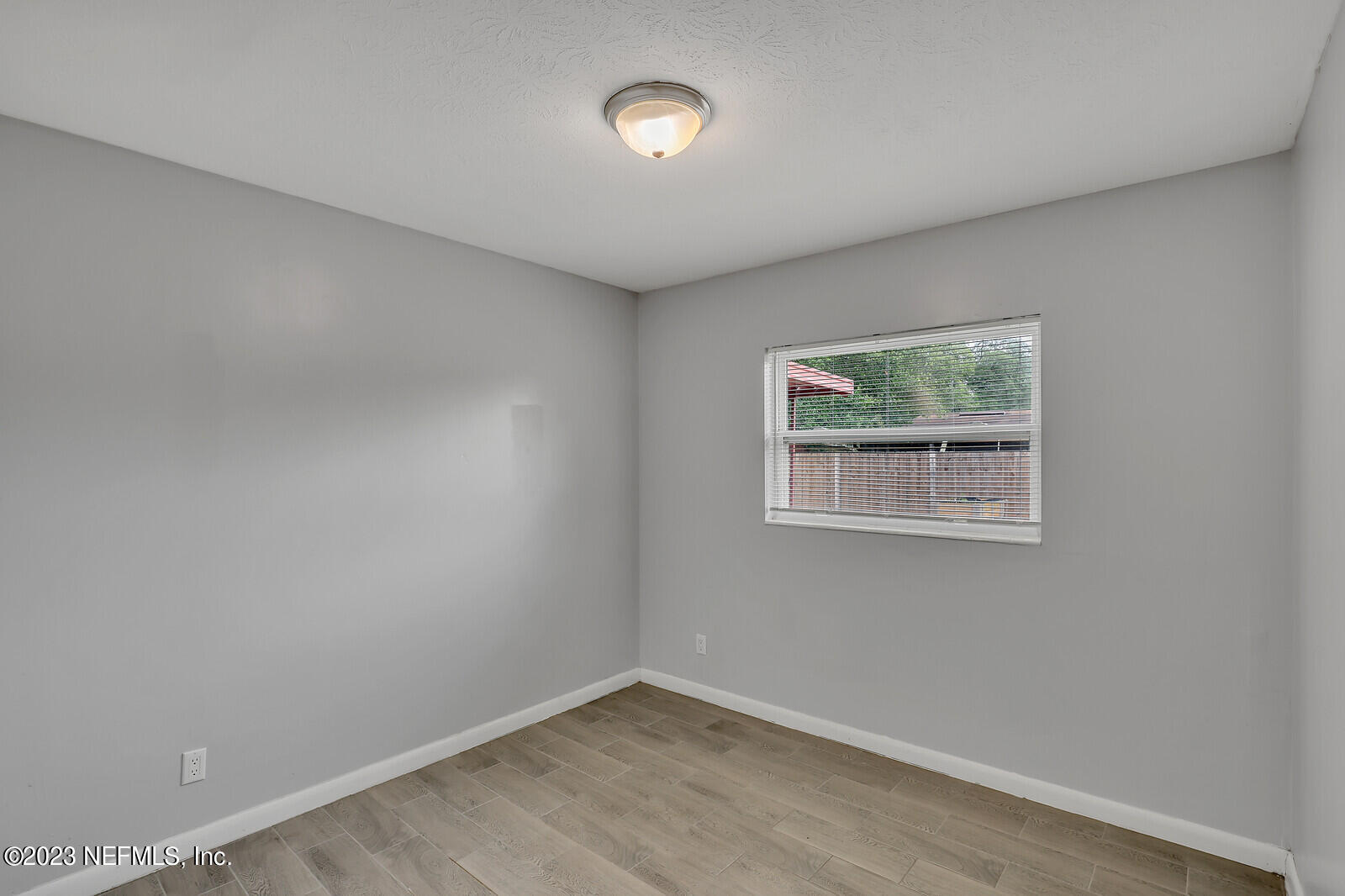 5814 Rover Drive Jacksonville, FL 32244 - Photo 9 of 30 an empty room with a window