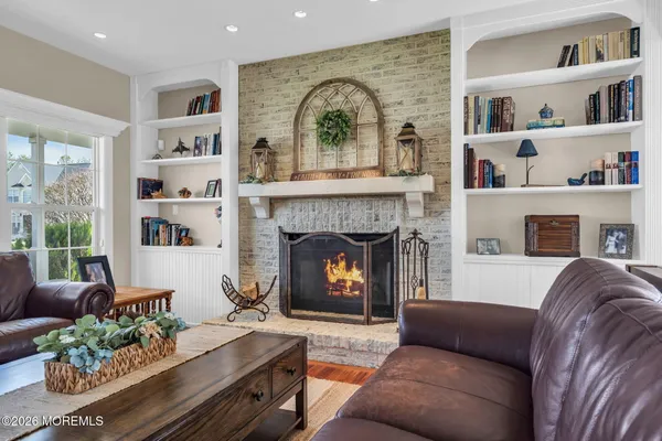 a view of a livingroom with furniture and windows