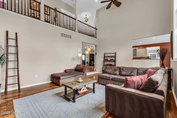 a bathroom with a bathtub and a window