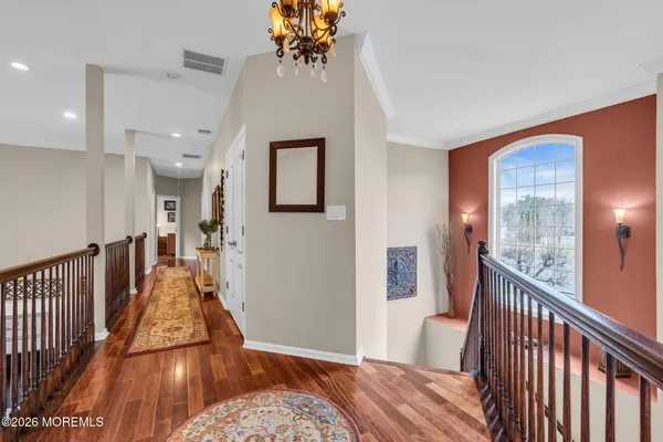 a picture of a bench in front of a wall