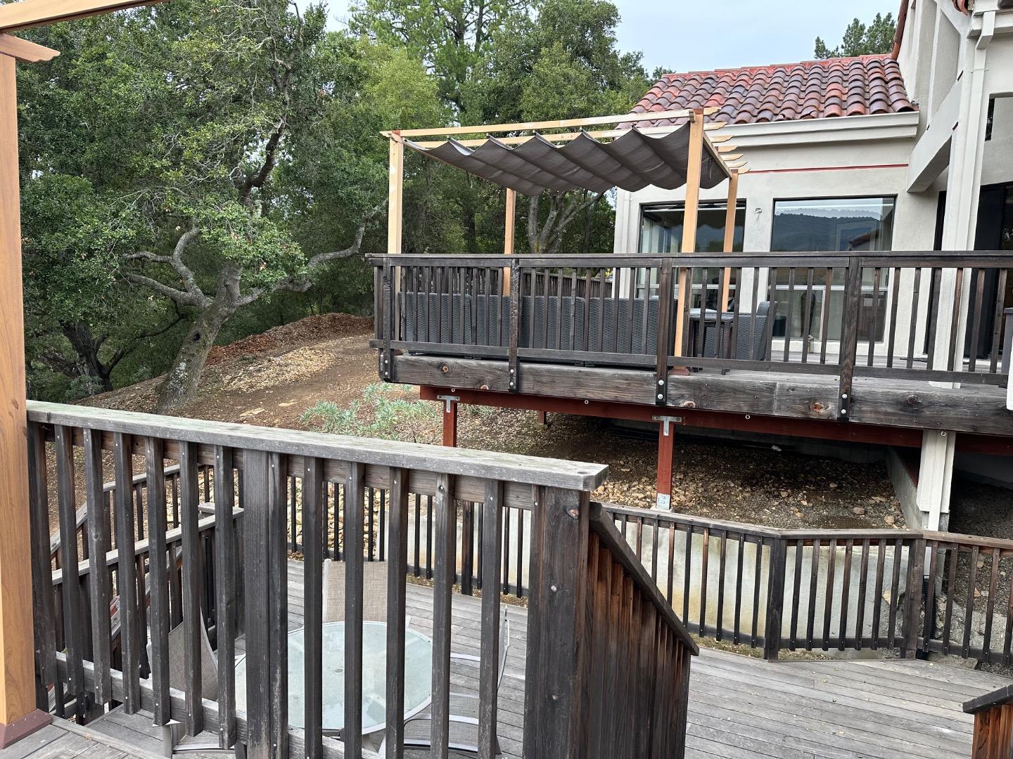 8255 Rancho Real Gilroy, CA 95020 - Photo 16 of 21 a balcony with wooden floor table and chairs