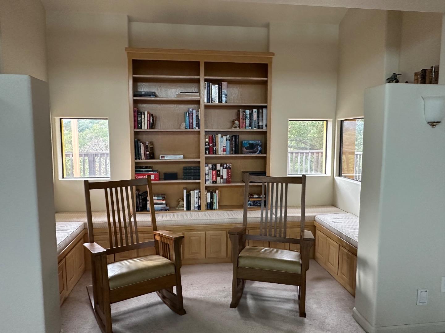 8255 Rancho Real Gilroy, CA 95020 - Photo 5 of 21 a work room with furniture wooden floor and a window