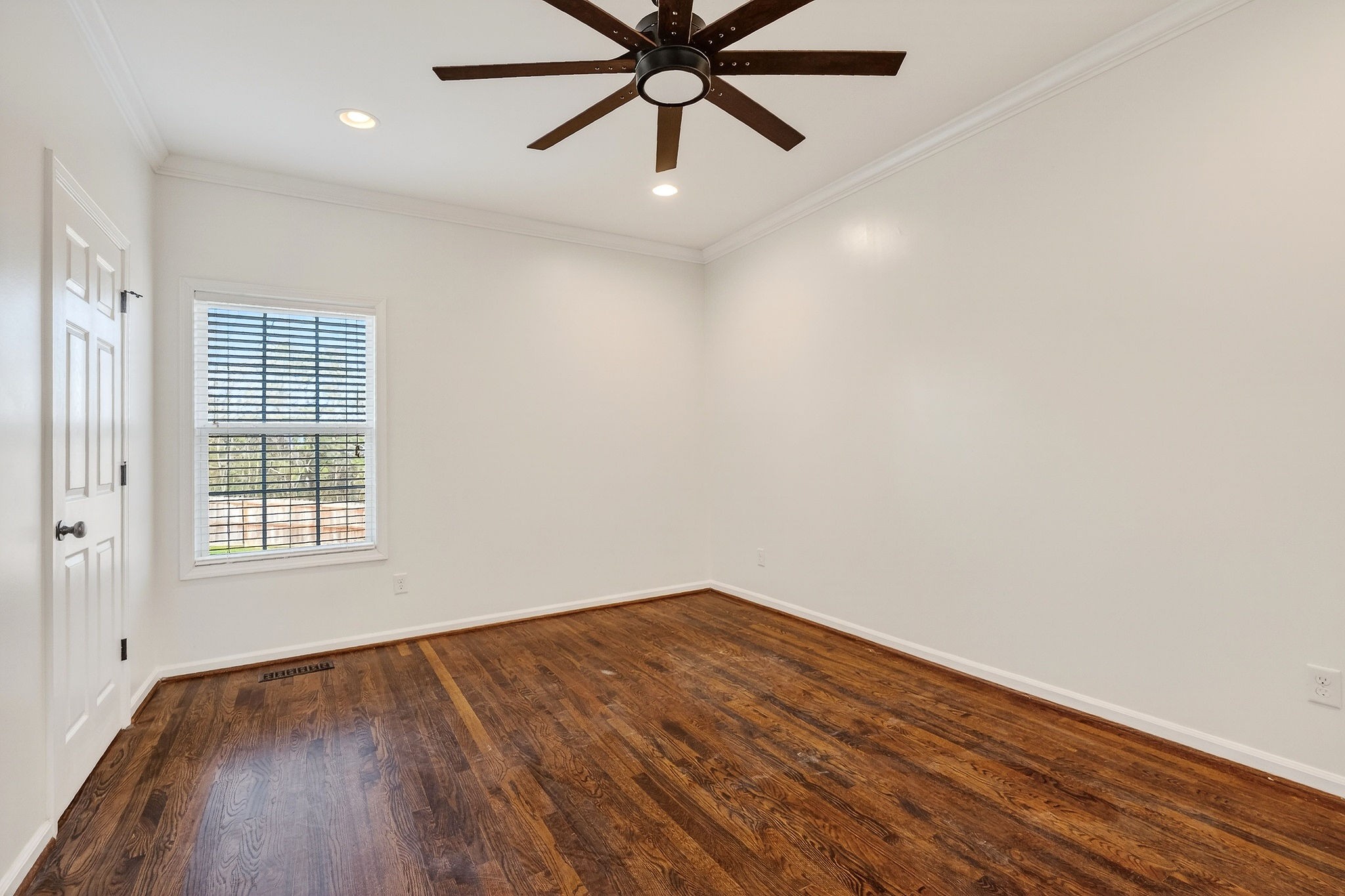 4029 Buffalo Valley Road Cookeville, TN 38501 - Photo 25 of 36 wooden floor in an empty room with a window