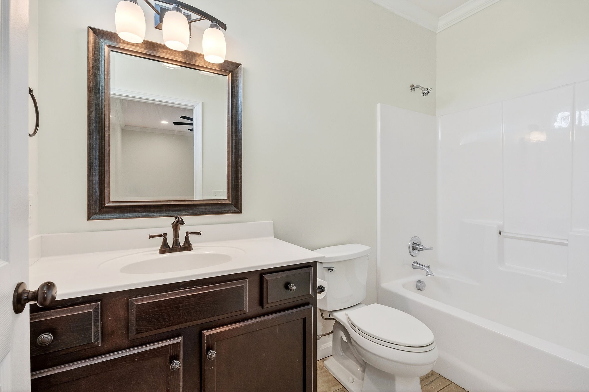 4029 Buffalo Valley Road Cookeville, TN 38501 - Photo 28 of 36 a bathroom with a sink a toilet and shower